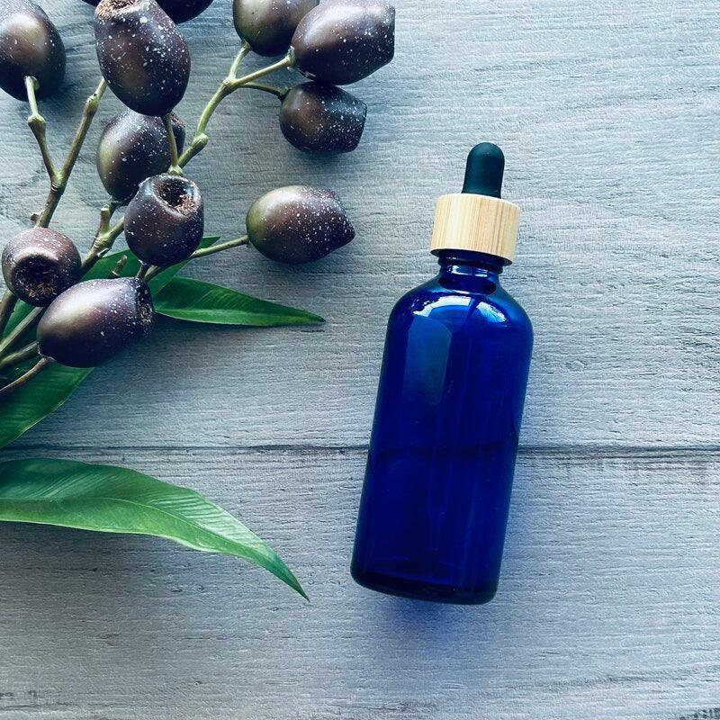 100ml Cobalt Blue Bottle with Black Bamboo Dropper - centaur packaging