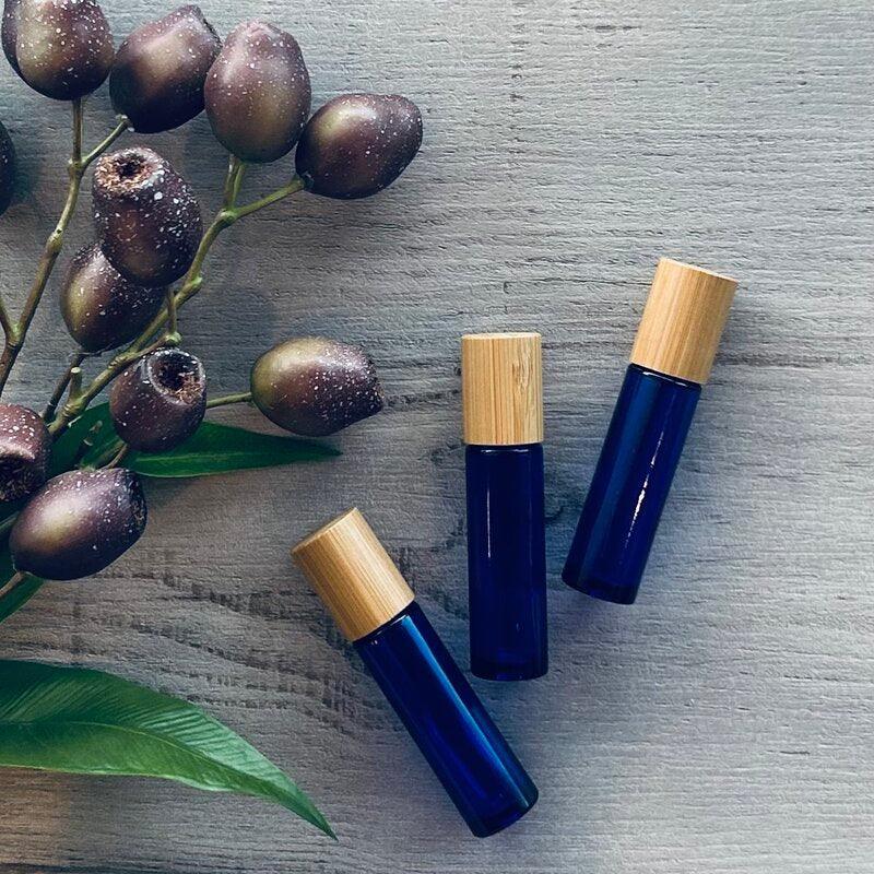 10ml Blue Roller Bottle with Bamboo Lid - centaur packaging