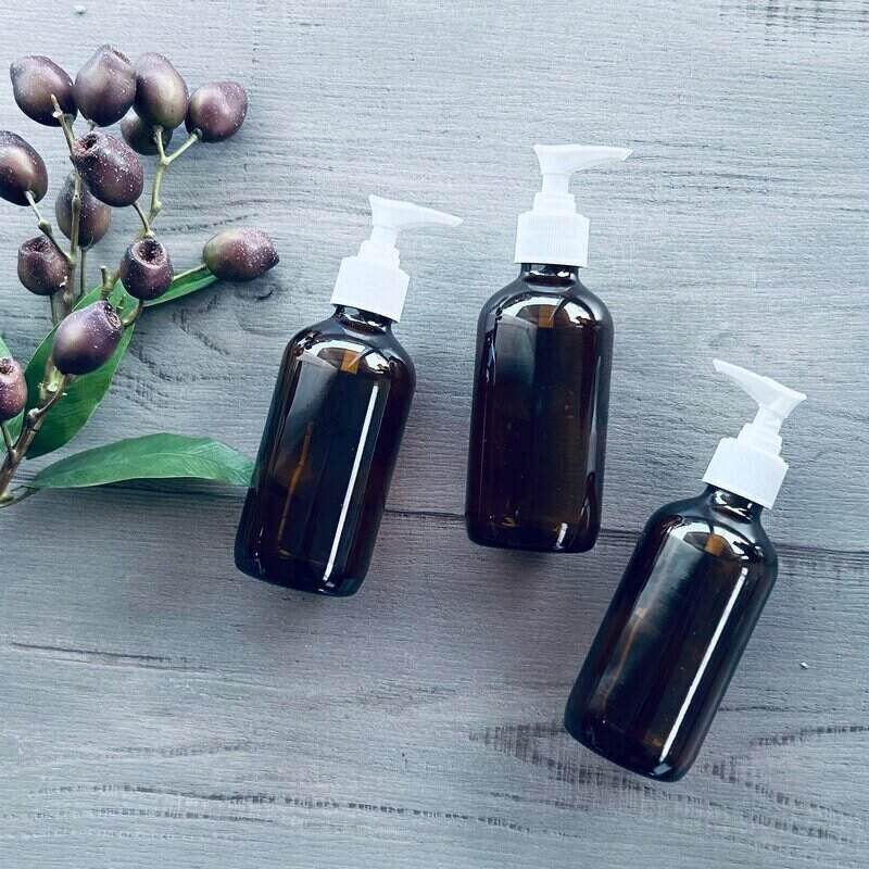 240ml amber glass bottle and white pump - centaur packaging