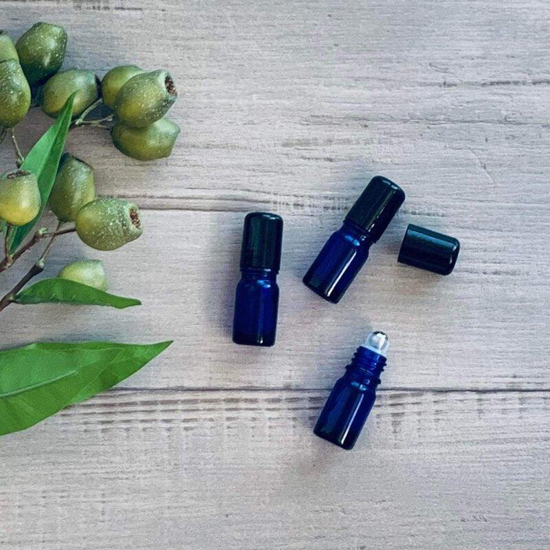 5ml Cobalt Blue Thick Glass Roller Bottle with Black Lids - centaur packaging