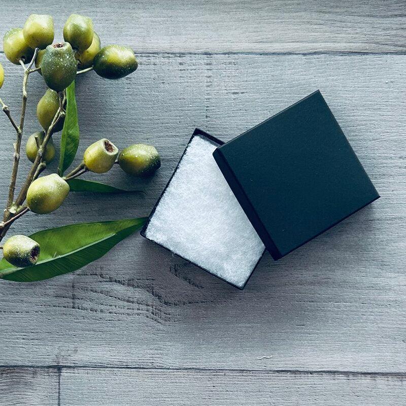 black medium square jewellery box with cotton fill