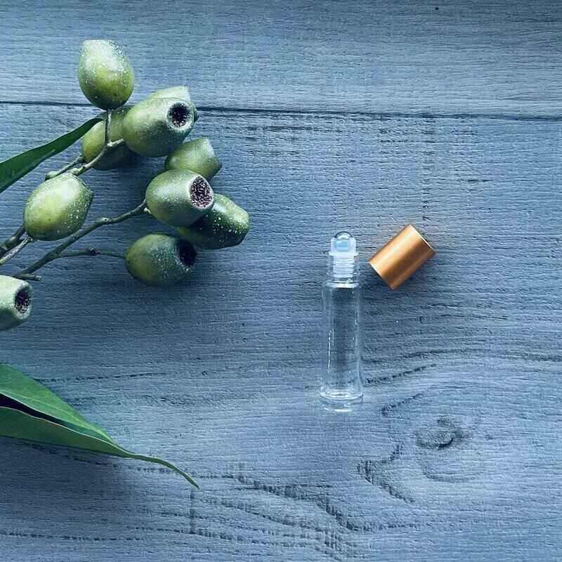 10ml clear roller bottle with deep gold lid