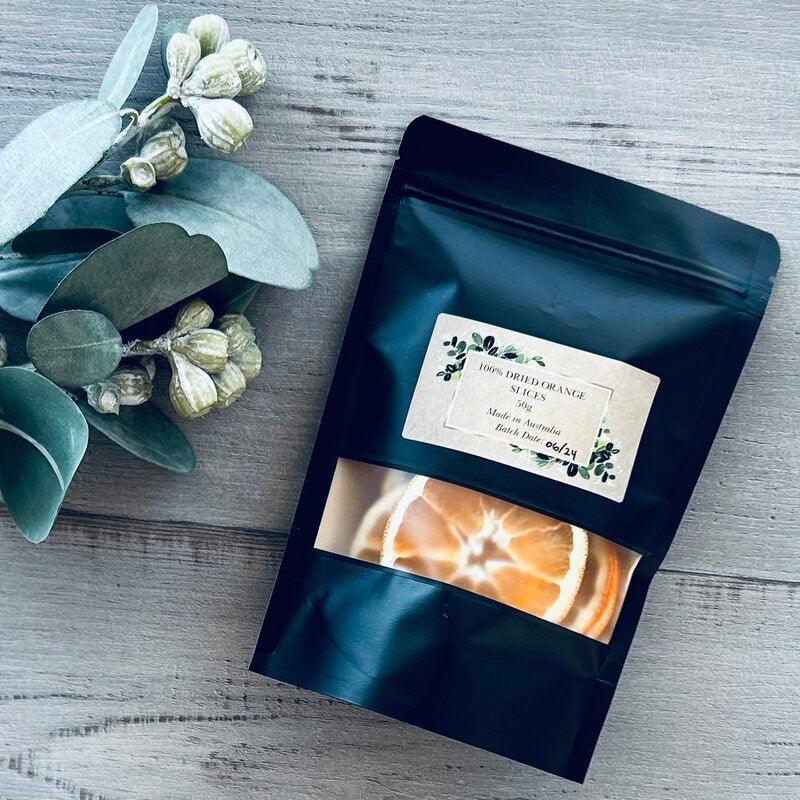 50g bag of orange slices in black resealable bag