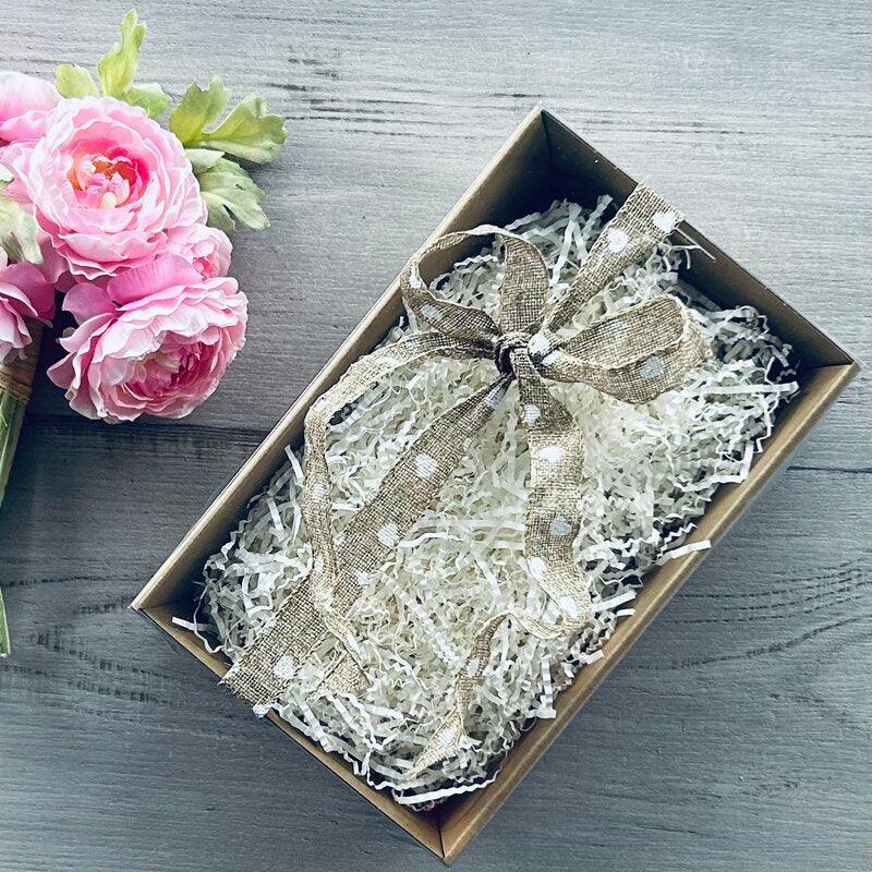 natural heart ribbon on kraft hamper white fill clear lid