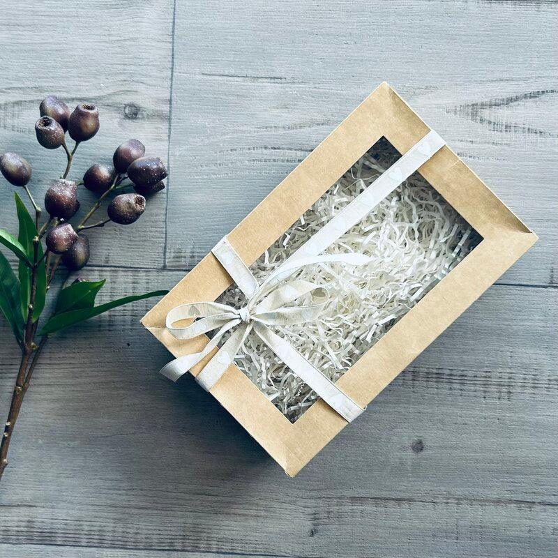 medium kraft hamper with eco lid, white shred and heart ribbon