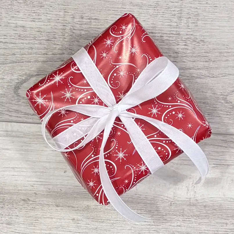 snow flurries red and white wrapping paper with white taffita ribbon
