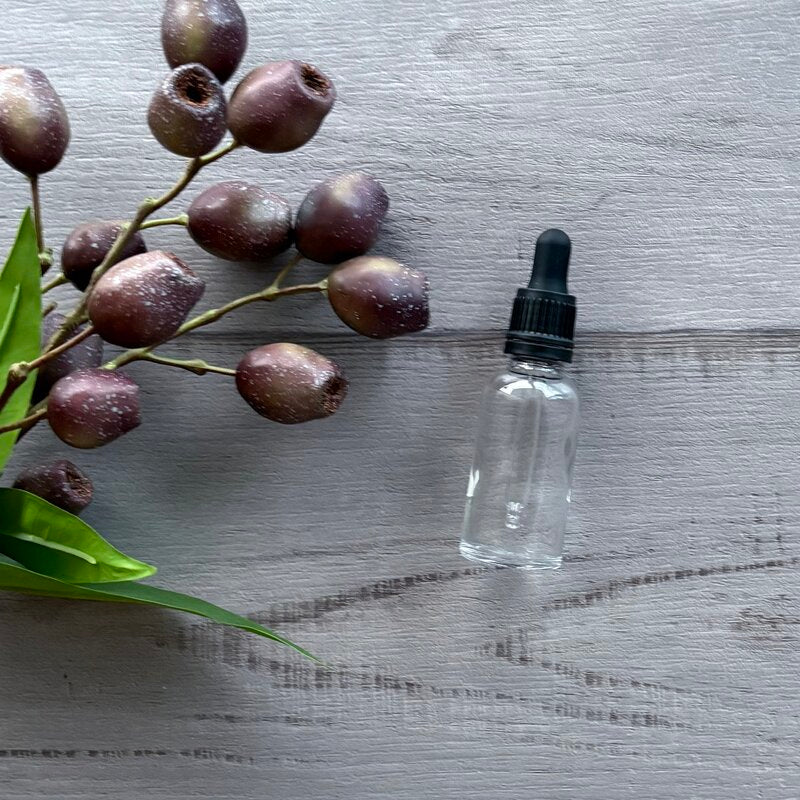 30ml clear glass bottle with black tamper evident dropper