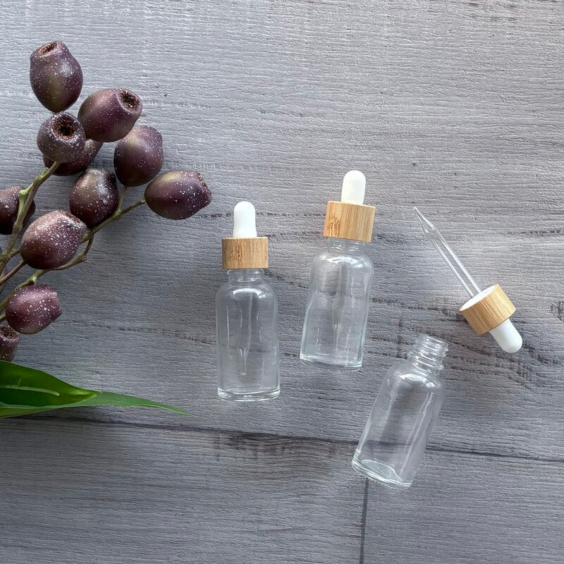 30ml clear lass bottle with white and bamboo dropper x 3