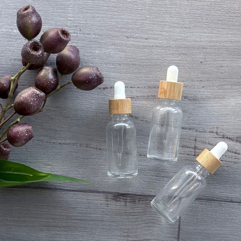 30ml clear lass bottle with white and bamboo dropper x 3