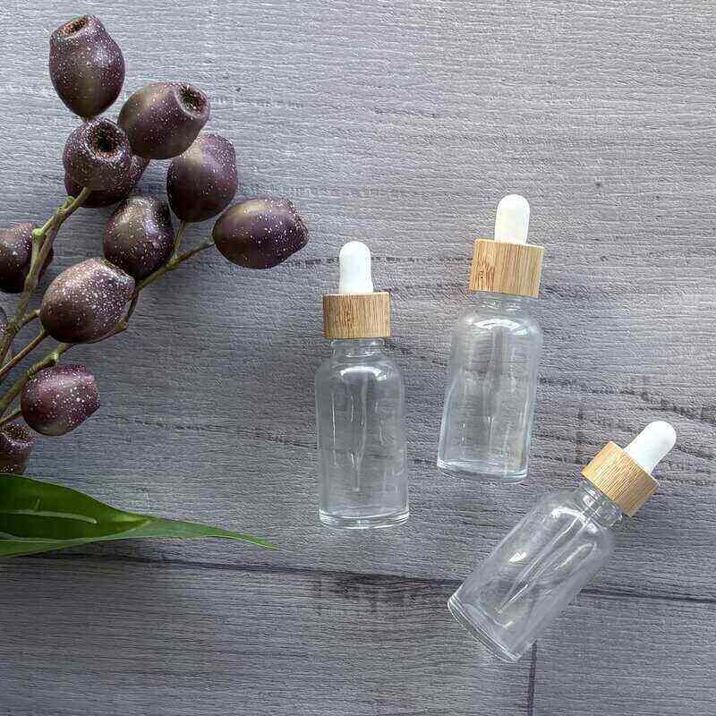 30ml clear lass bottle with white and bamboo dropper x 3