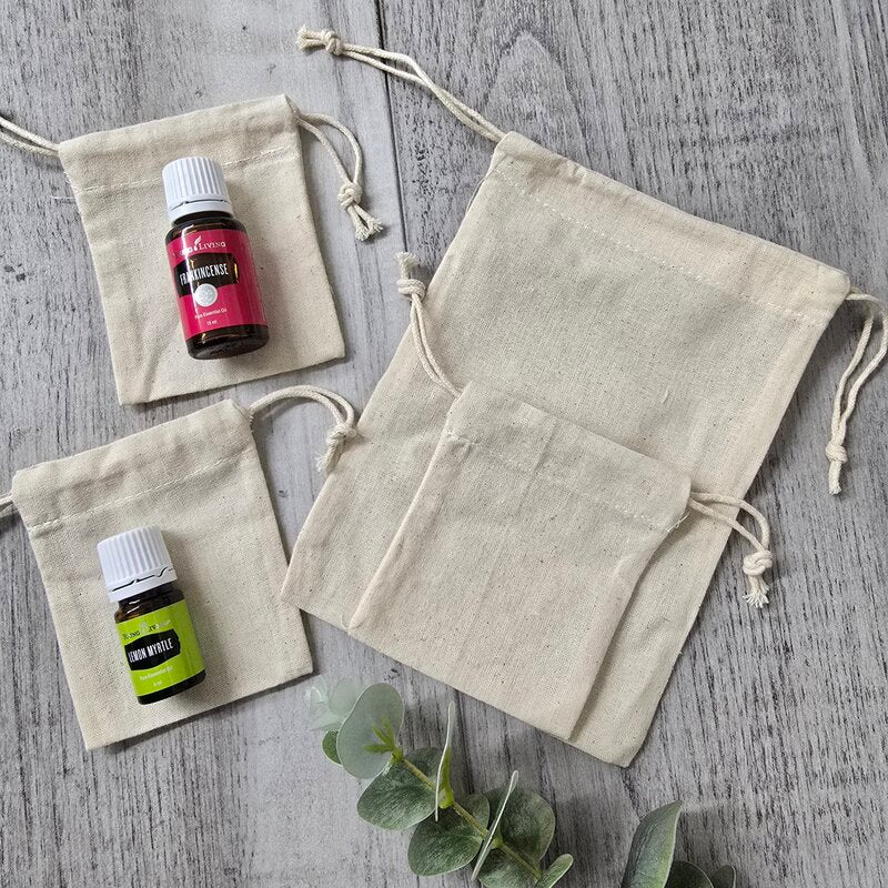 extra small and tiny calico bags with essential oil bottles on top