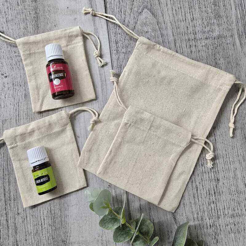 extra small and tiny calico bags with essential oil bottles on top