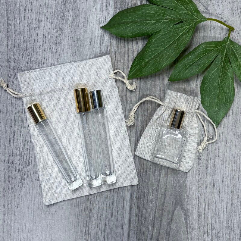 calico pouches two sizes with perfume bottles on top