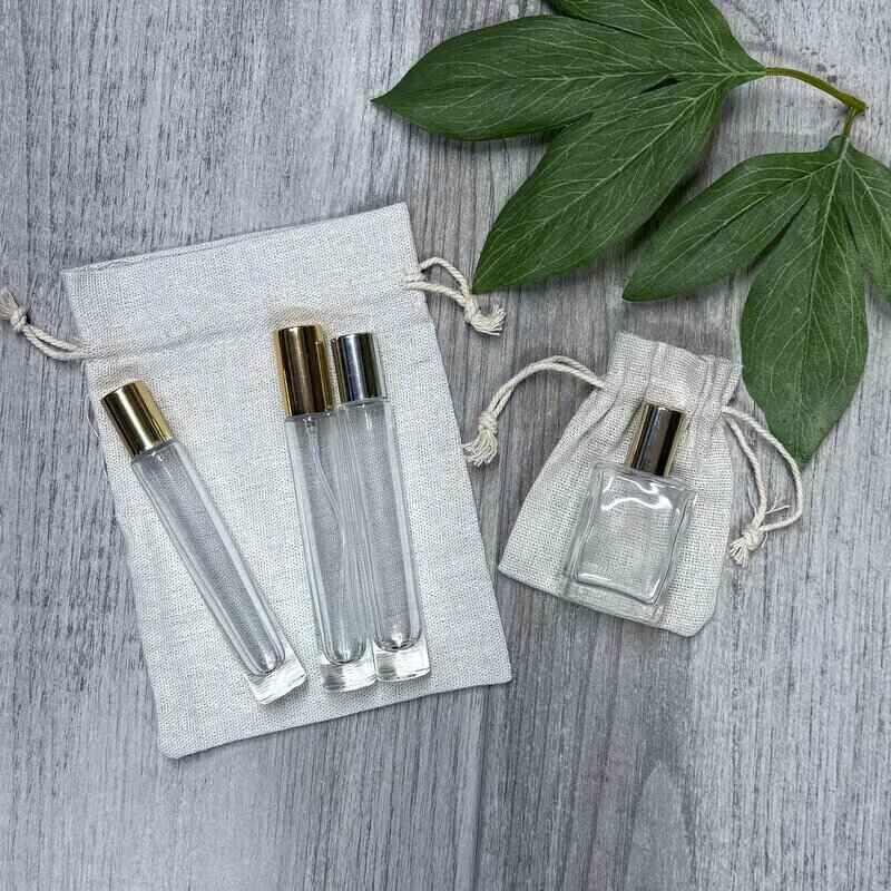 calico pouches two sizes with perfume bottles on top