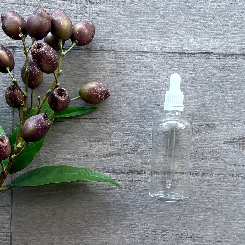 100ml clear glass bottle with white tamper evident dropper