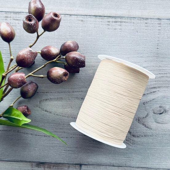 centaur packaging - beige paper curling ribbon