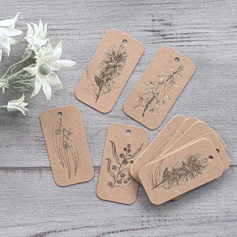 Kraft cardboard botanical gift tags with gold printing, featuring bottlebrush, wattle, gum leaf and honeysuckle designs, 20 pack.