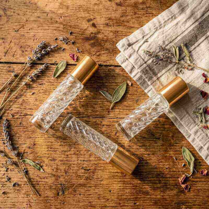 spiral roller bottles on timber bench