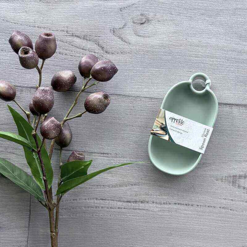 Appetito moss silicone spoon rest for resting cooking utensils during meal preparation.