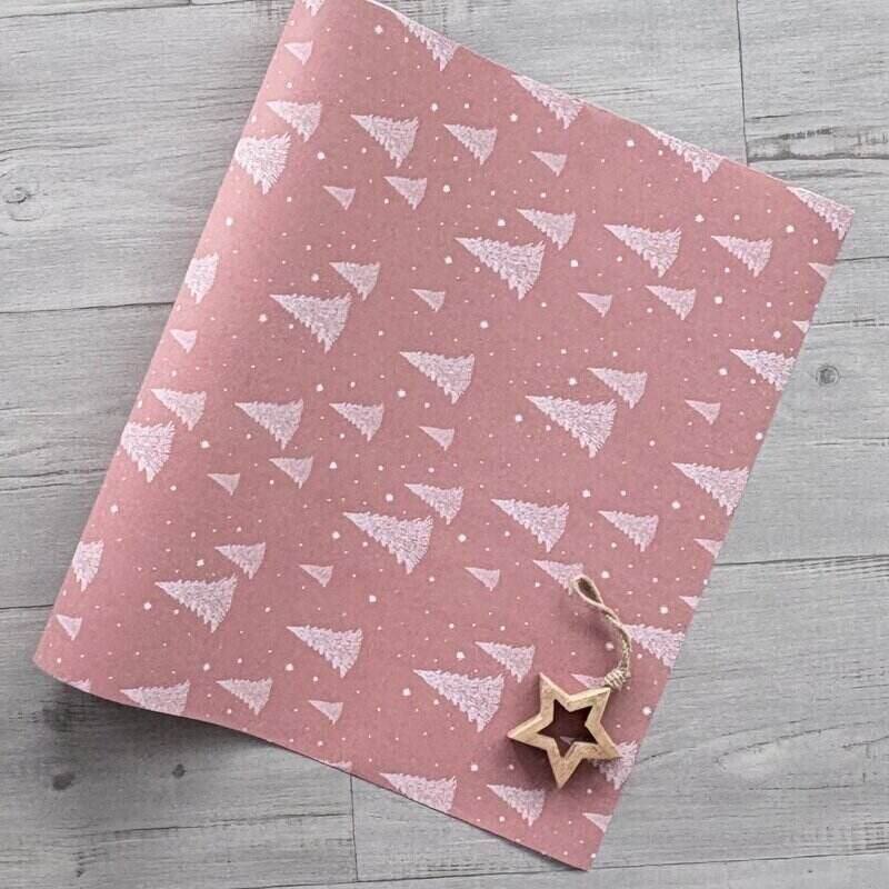 Starry Night dusty rose Christmas wrapping paper with white Christmas trees and stars, 80gsm, supplied in a 600mm wide by 40-metre roll.