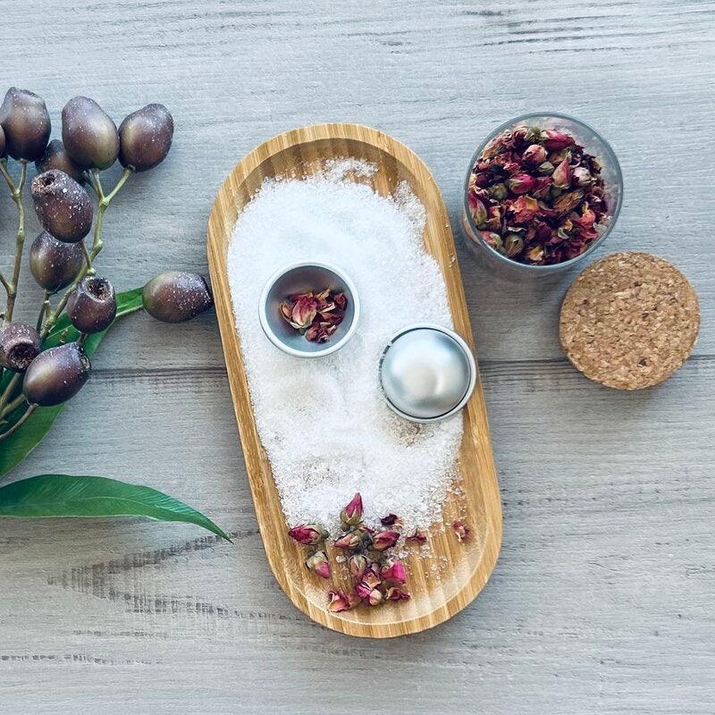 small bath bomb moulds with rose petals and salt