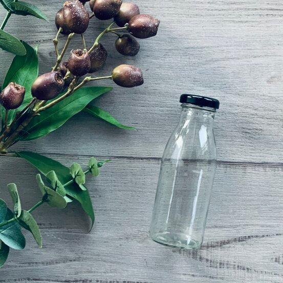 250ml Glass Milk Bottle Black Lid - centaur packaging