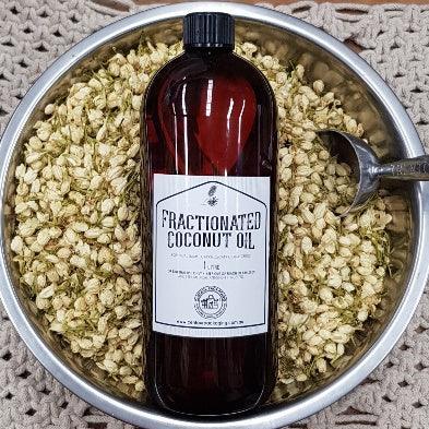 Fractionated Coconut Oil- 1lt bottle - in metal bowl with dried flowers- centaur packaging