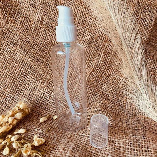 100ml Pet clear bottle with white Syrum pump - centaur packaging