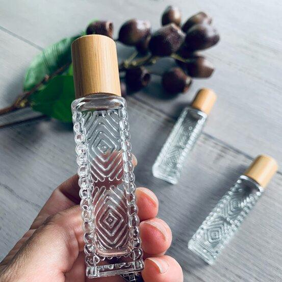 14ml ADELE Clear Glass Bottle with Roller Bamboo Lid - centaur packaging
