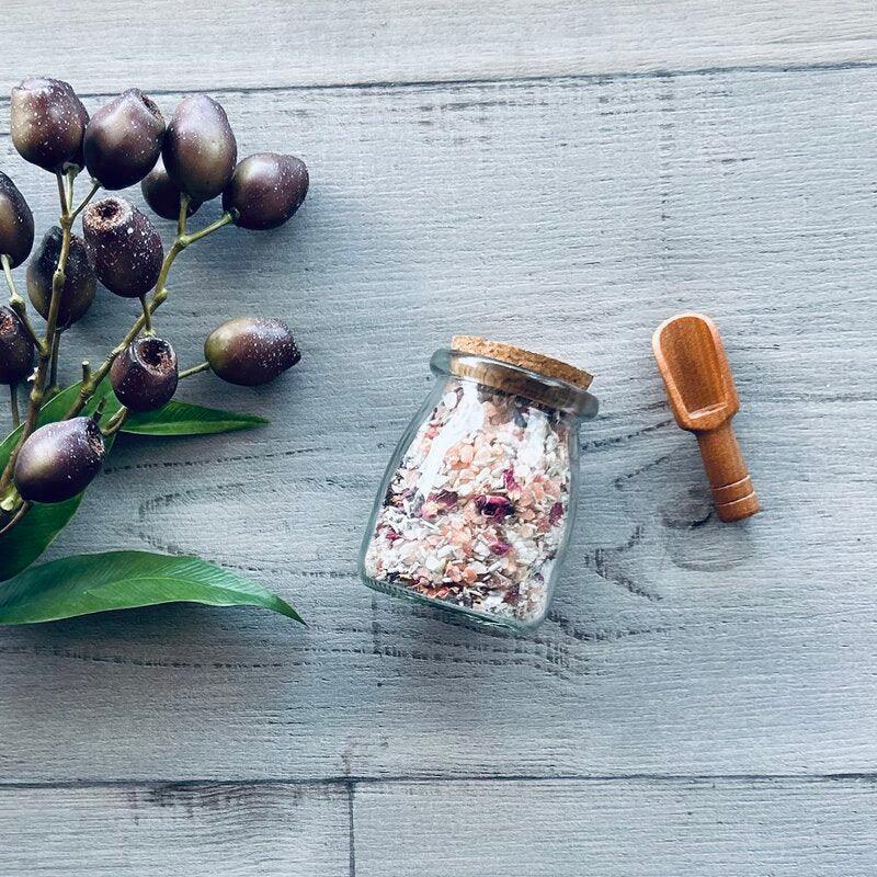 190ml clear jar with cork lid with bath salts and wooden scoop