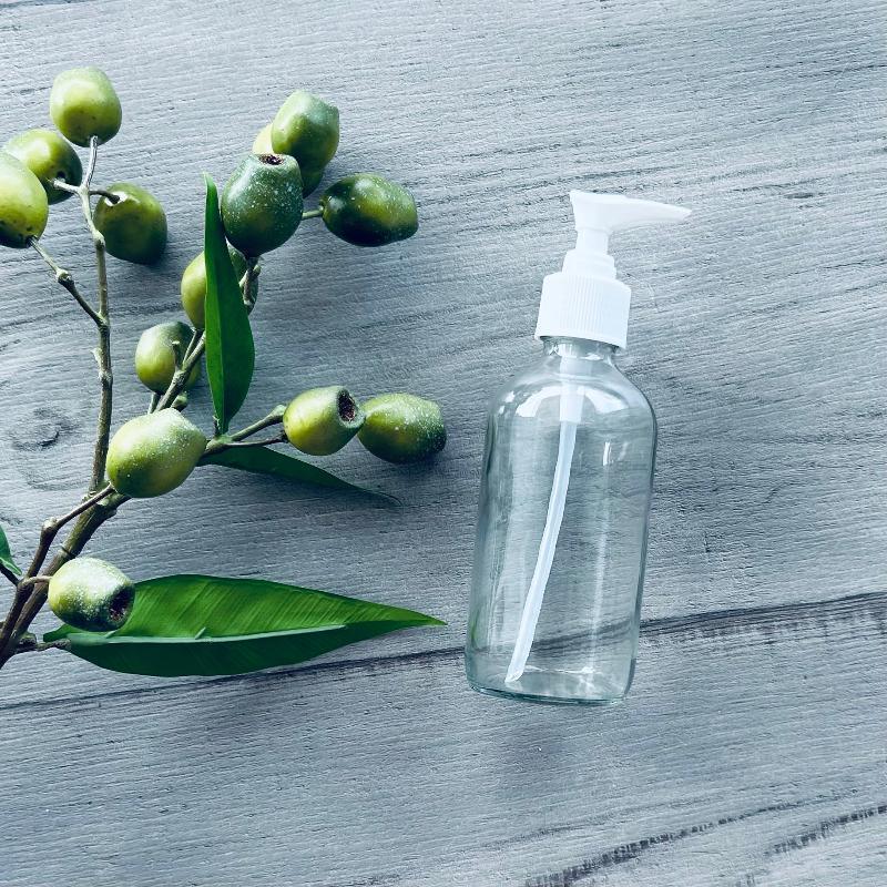 240ml clear glass bottle with white plastic pump