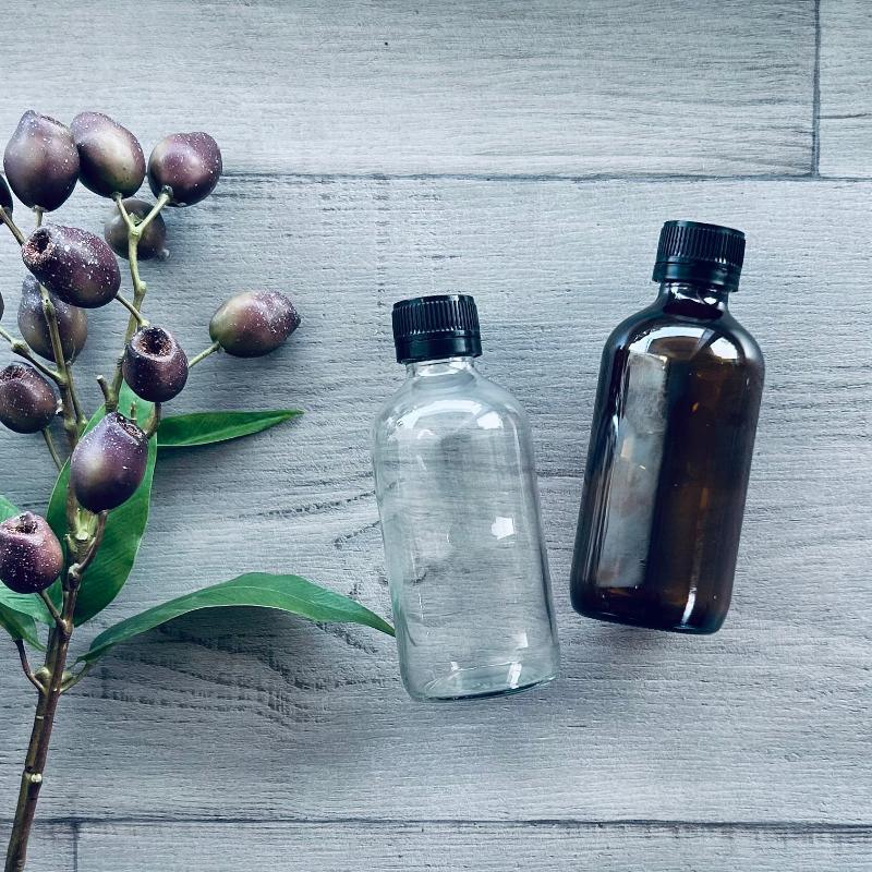 240ml amber & clear glass bottle with black tamper evident cap