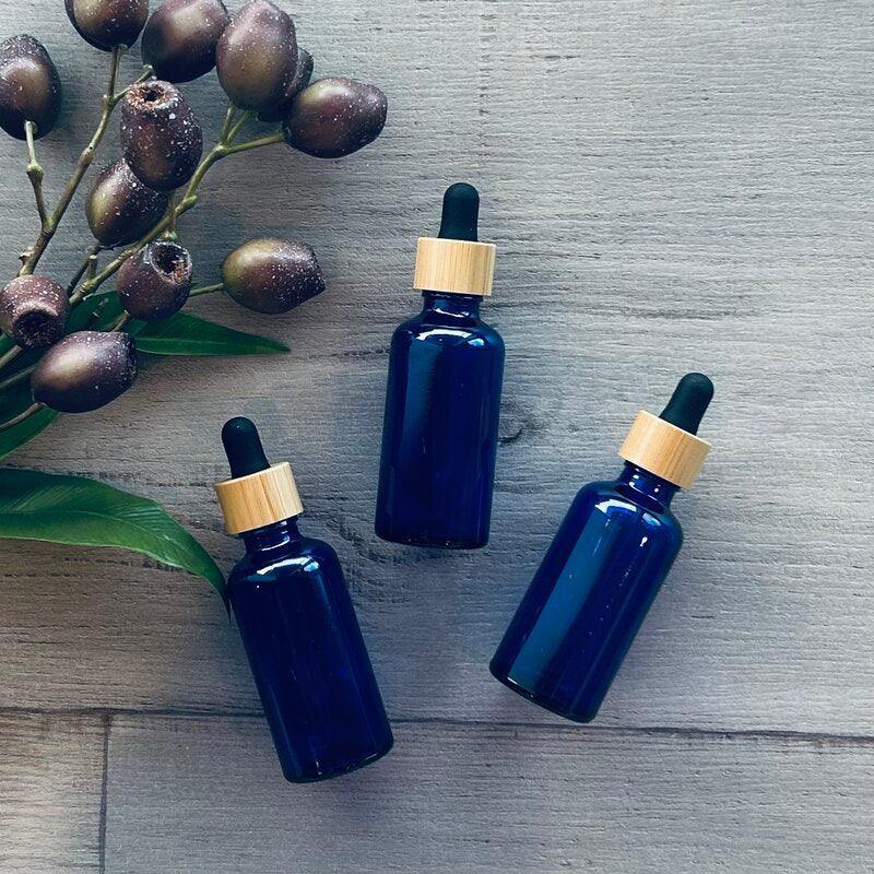 50ml Cobalt Blue Bottle with Black Bamboo Dropper - centaur packaging