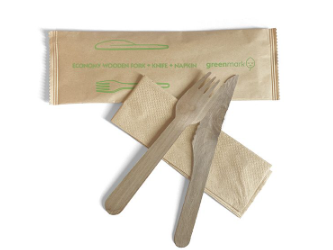 Set of wooden cutlery with a napkin and packaging on a white background