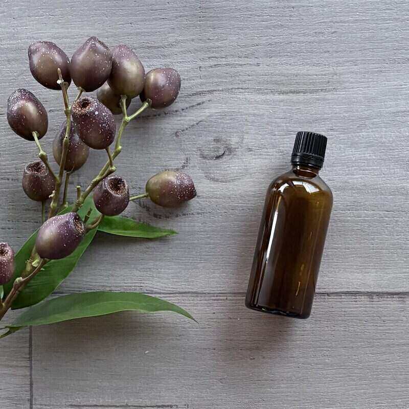 100ml amber glass bottle with black tamper evident lid