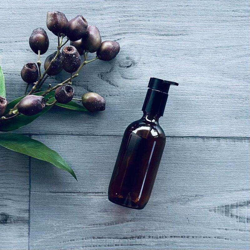 200ml amber glass bottle with black pump