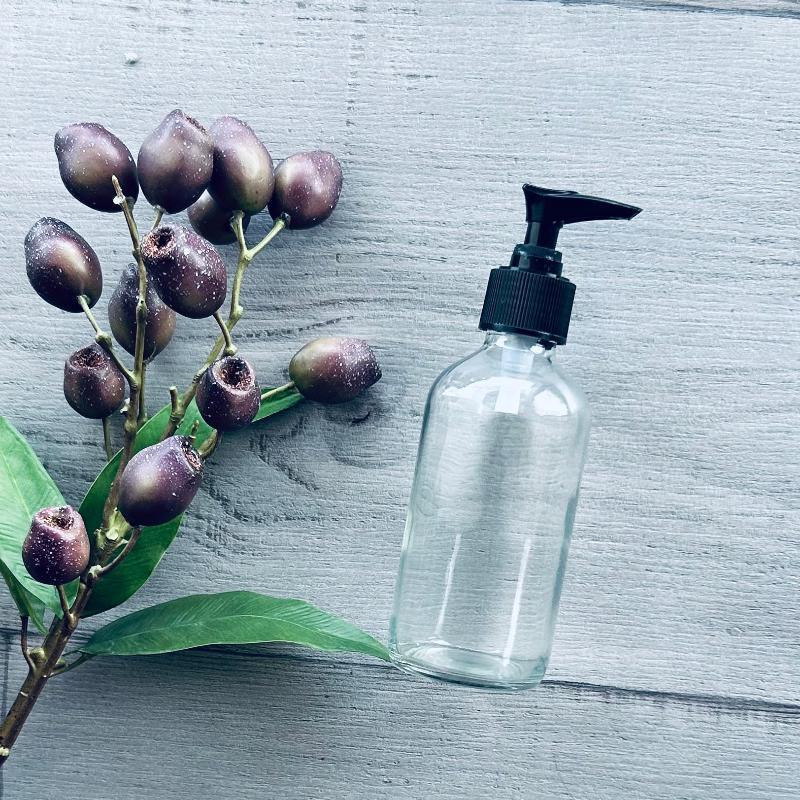 240ml clear glass bottle with black plastic pump