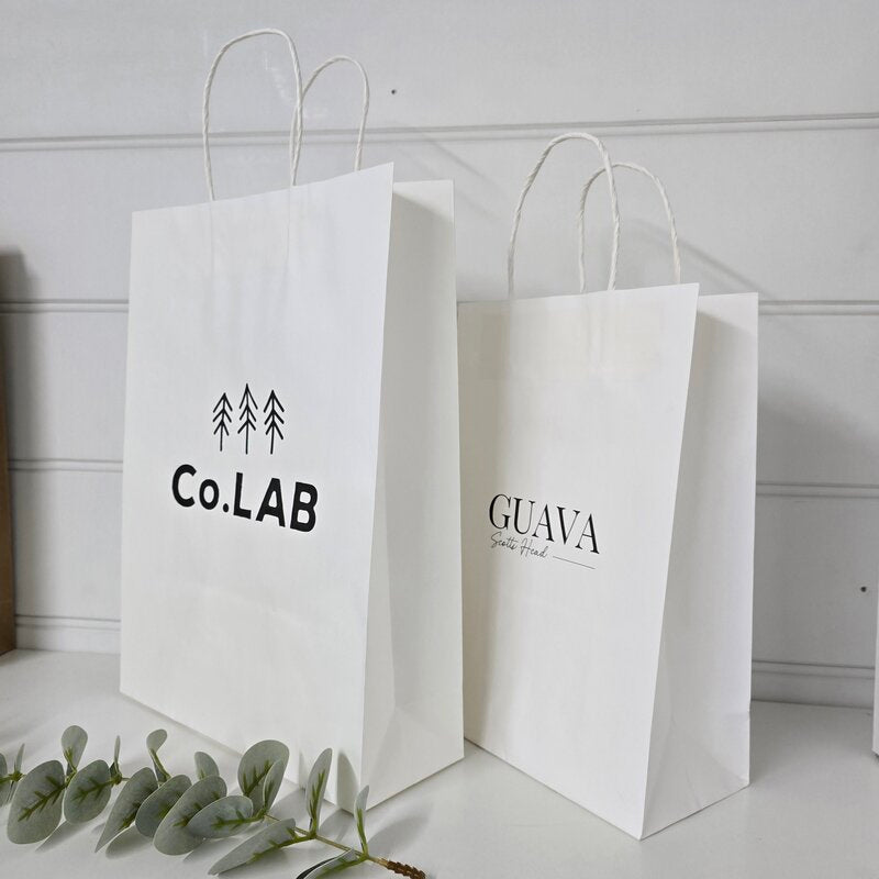 WJ & W1 white paper bags with custom printing and handles @ centaur packaging Bomaderry