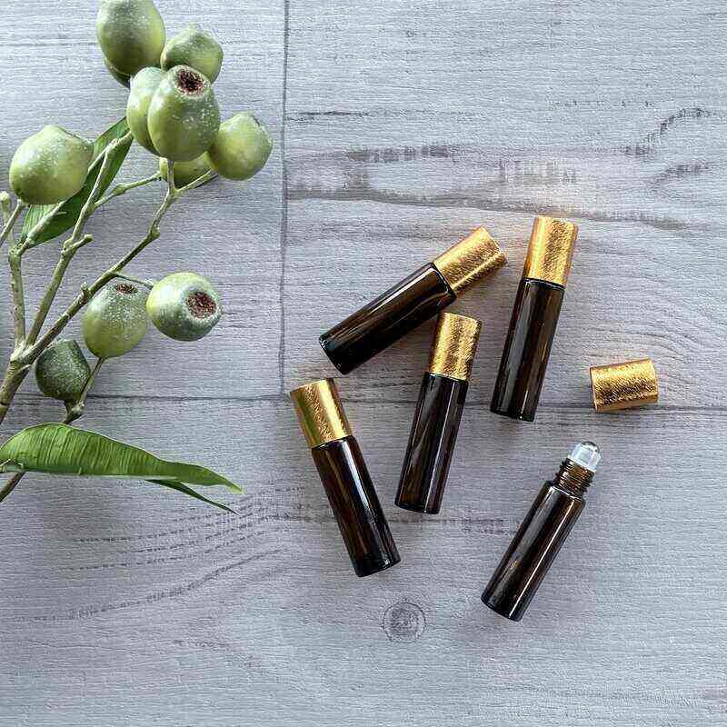 10ml Amber Roller Bottle with Brushed Gold Lid - 5 Pack lid off