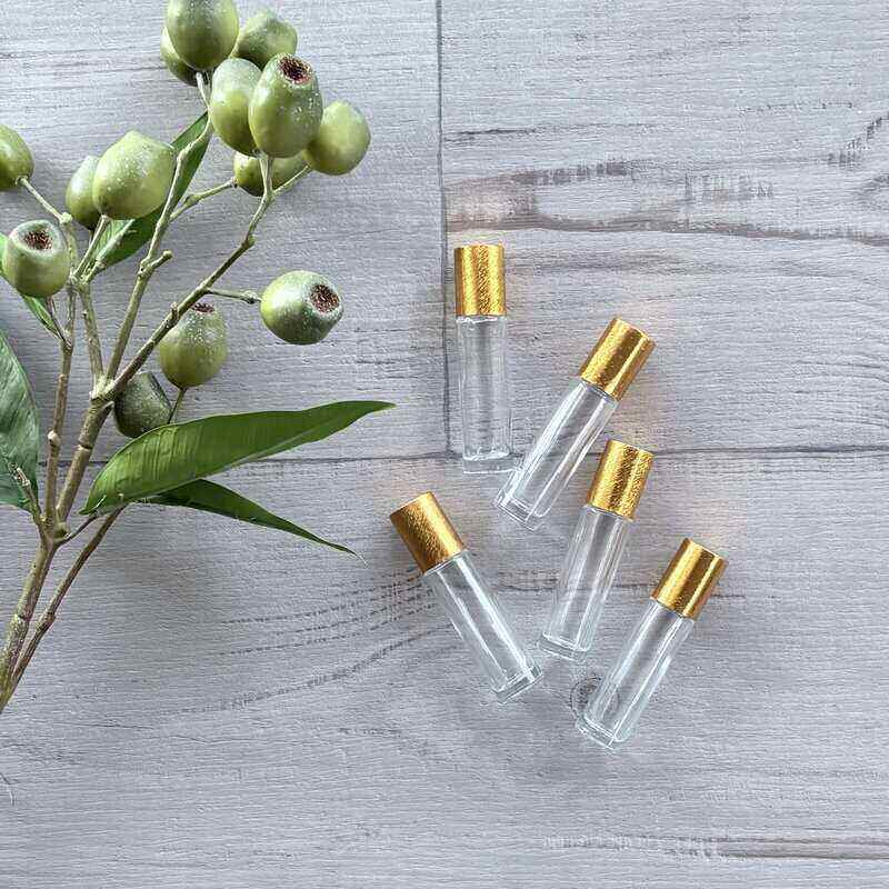 10ml Clear Roller Bottle with Brushed Gold Lid - 5 Pack lid on