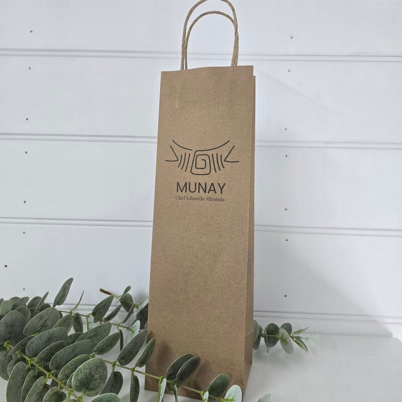 Kraft paper wine bag with 'MUNAY' branding on a white background