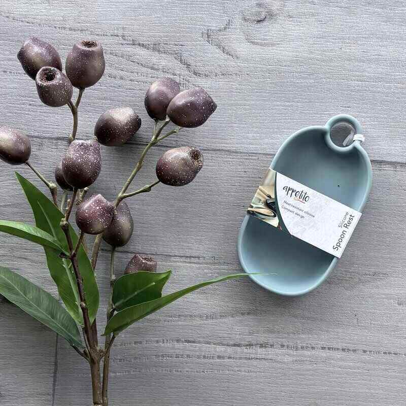 Appetito blue silicone spoon rest designed to hold cooking utensils and help keep kitchen benchtops clean.