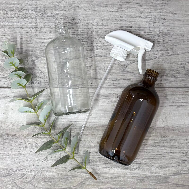 white mister trigger budget to fit 28mm bottle neck with bottles next to trigger