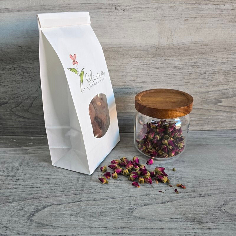 white medium tin tie bag with window with jar of rose buds side view