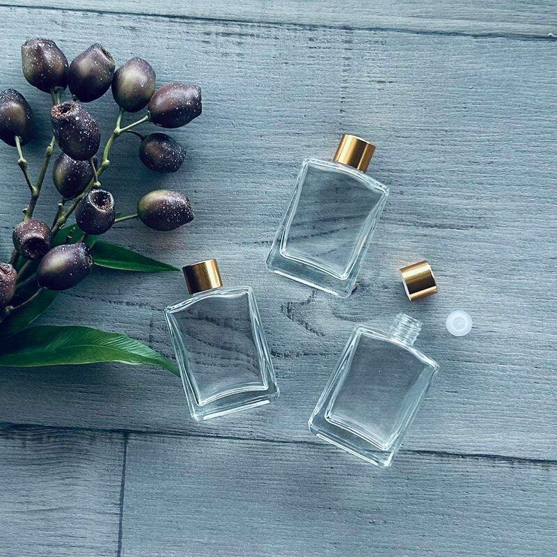 50ml glass square bottle with gold lid and plastic stopper x 3