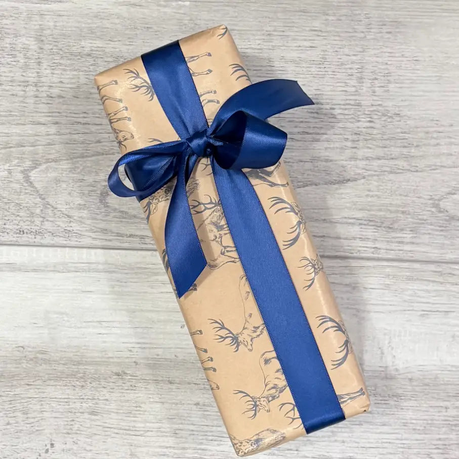 Wrapping Paper - Stag Navy on Kraft with navy satin ribbon