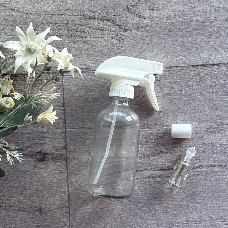 240ml clear bottle with white mister trigger & a 5ml clear roller with white lid - centaur packaging