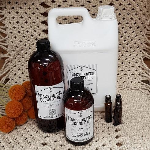 Fractionated Coconut Oil- 500ml - 1l and 500ml bottles with amber 10ml rollers -centaur packaging